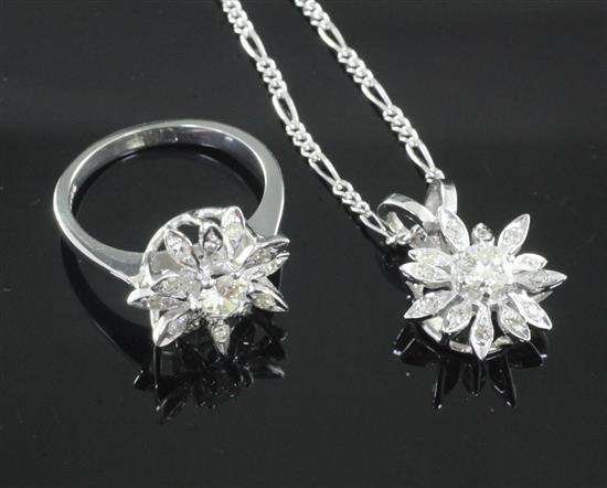 A diamond cluster ring in the form of a flowerhead and a matching pendant, 18ct white gold setting (formerly a pair of earrings)